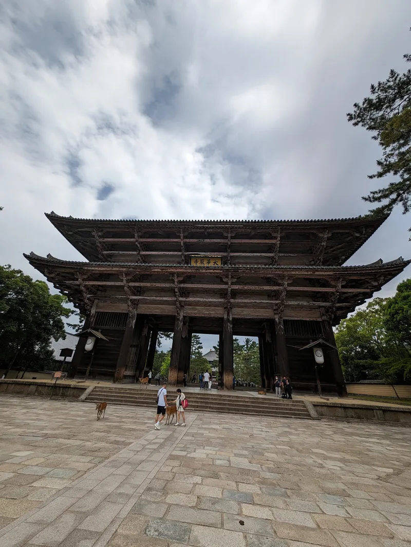 Wide view of Todai-ji Temple's grand wooden Nandaimon Gate in Nara, Japan.