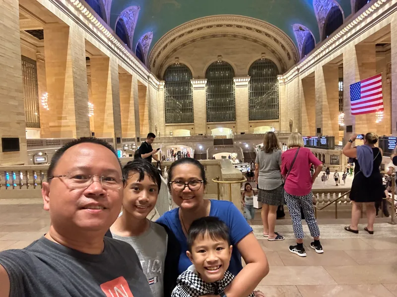 Grand Central Terminal is stunning Family selfie inside Grand Central Terminal with grand architecture