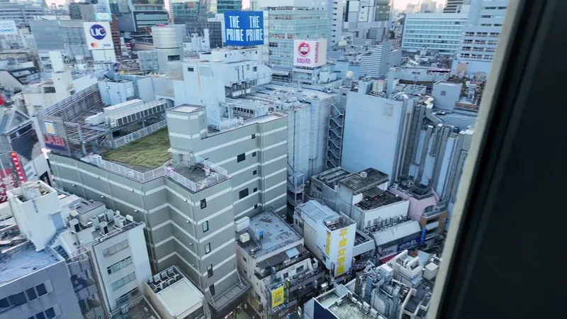 Aerial view of dense Tokyo rooftops and urban landscape from Hotel Indigo Shibuya, Tokyo, Japan